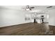 Bright, open-concept living space showcasing hardwood floors and natural light from large windows at 425 Messner St, Salisbury, NC 28144