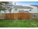 Private fenced backyard with lush green grass, providing a serene and secure outdoor space at 4507 Antelope Ln, Charlotte, NC 28269
