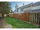 Private fenced backyard with lush green grass, providing a serene and secure outdoor space at 4507 Antelope Ln, Charlotte, NC 28269