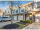 Charming townhome featuring a brick facade, single-car garage, manicured front yard, and inviting entrance at 4507 Antelope Ln, Charlotte, NC 28269