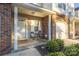 Inviting front porch featuring a seating area, decorative welcome mat, and elegant white door at 4507 Antelope Ln, Charlotte, NC 28269