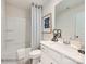 The bathroom features modern fixtures, a combined tub and shower, and bright decor, creating a fresh, clean aesthetic at 4625 Potters Wheel Dr, Fort Mill, SC 29715
