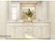 Neutral bathroom with double vanity, modern fixtures, and tile shower at 4633 Potters Wheel Dr, Fort Mill, SC 29715