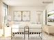 Bright living room featuring modern seating, stylish decor, and neutral color palette at 4633 Potters Wheel Dr, Fort Mill, SC 29715