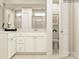 Bright bathroom featuring a double vanity, modern fixtures, and a separate toilet area at 4641 Potters Wheel Ct, Fort Mill, SC 29715