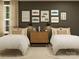 Shared bedroom featuring two beds, a central nightstand, and stylish car-themed decor at 4641 Potters Wheel Ct, Fort Mill, SC 29715