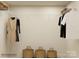 Well-organized closet with ample hanging space and storage baskets for optimal organization at 4641 Potters Wheel Ct, Fort Mill, SC 29715