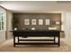 This game room features a sleek black foosball table and stylish wall art at 4641 Potters Wheel Ct, Fort Mill, SC 29715