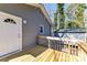 Backyard view of the house showing the deck, siding, and storage shed at 4924 Jane Ave, Charlotte, NC 28269