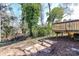 Picturesque backyard view showcasing the deck and lush surroundings, creating a serene outdoor space at 4924 Jane Ave, Charlotte, NC 28269