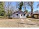 Charming one-story home with gray siding, white trim, and a welcoming front door at 4924 Jane Ave, Charlotte, NC 28269