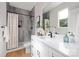 Modern bathroom features a sleek vanity, tiled shower, and contemporary fixtures at 5404 Maplewood Ln, Charlotte, NC 28227
