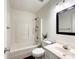 Bathroom with shower-tub combination, white vanity, and modern fixtures at 5610 Stone Bluff Ct, Charlotte, NC 28214