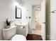 Bathroom featuring a vanity, modern fixtures, and a view to the hallway at 5610 Stone Bluff Ct, Charlotte, NC 28214
