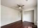 Bright bedroom with hardwood floors and ceiling fan at 5610 Stone Bluff Ct, Charlotte, NC 28214
