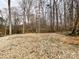 Cleared area with gravel ground, bordered by a wooded area at 5610 Stone Bluff Ct, Charlotte, NC 28214