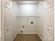 Laundry room featuring a wire rack and washer/dryer hookups at 5610 Stone Bluff Ct, Charlotte, NC 28214