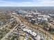 Birds eye view of a neighborhood featuring houses, retail, and restaurants at 701 S Torrence St, Charlotte, NC 28204