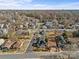 Aerial view of a residential area with charming homes, tree-lined streets, and a new construction site visible at 701 S Torrence St, Charlotte, NC 28204