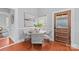 Cozy dining nook with a round table, seating for four, natural light, and wood floors at 701 S Torrence St, Charlotte, NC 28204