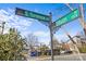 A view of Cherry Street and S. Torrence Street signs with city buildings and parked cars in the background at 701 S Torrence St, Charlotte, NC 28204