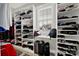 Walk-in closet with lots of storage shelves, cabinets, and a window for natural light at 894 Abilene Ln, Fort Mill, SC 29715