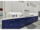 Well-equipped kitchen features custom cabinets, white countertops and modern appliances at 894 Abilene Ln, Fort Mill, SC 29715