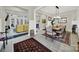 Open-concept living space with stylish decor, hardwood flooring, and an inviting atmosphere at 894 Abilene Ln, Fort Mill, SC 29715
