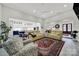 Open-concept living space seamlessly connects to the kitchen, dining room, and entryway at 894 Abilene Ln, Fort Mill, SC 29715