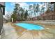 Beautifully landscaped backyard with a sparkling pool and ample space for entertaining at 894 Abilene Ln, Fort Mill, SC 29715
