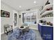 Cozy sitting room with a view of the backyard, bright interior and a coffee bar at 894 Abilene Ln, Fort Mill, SC 29715