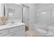 Bright bathroom featuring a bathtub and shower combination and a single sink vanity at 116 Shay Crossing Rd # 2P, Salisbury, NC 28144