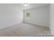 Cozy bedroom with plush carpeting, ample natural light, and a calming ambiance at 116 Shay Crossing Rd # 2P, Salisbury, NC 28144