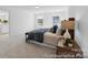 Inviting bedroom with lots of natural light, a comfortable bed, and neutral decor at 116 Shay Crossing Rd # 2P, Salisbury, NC 28144