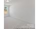 Simple bedroom with plush carpeting, a window offering natural light at 116 Shay Crossing Rd # 2P, Salisbury, NC 28144