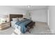 Well-lit bedroom featuring plush carpeting, natural light, and comfortable furnishings at 116 Shay Crossing Rd # 2P, Salisbury, NC 28144