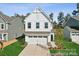 Charming two-story home features a modern facade, well-manicured lawn, and attached garage at 116 Shay Crossing Rd # 2P, Salisbury, NC 28144