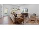 Inviting living room features hardwood floors, large windows, and stylish furniture at 116 Shay Crossing Rd # 2P, Salisbury, NC 28144