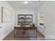 Dedicated home office space with a functional desk, shelving, and natural light at 116 Shay Crossing Rd # 2P, Salisbury, NC 28144