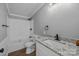 Bathroom featuring a shower-tub, toilet, and vanity with a stone countertop at 1254 Raxter Rd, Edgemoor, SC 29712