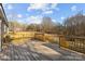 Spacious wooden deck with railings overlooking the backyard, providing ample space for outdoor entertaining at 1254 Raxter Rd, Edgemoor, SC 29712