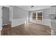 Bright dining room with hardwood floors, wainscoting, and natural light, perfect for entertaining guests at 1254 Raxter Rd, Edgemoor, SC 29712