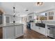 Charming kitchen with stainless steel appliances, white cabinets, and a farmhouse style sink at 1254 Raxter Rd, Edgemoor, SC 29712