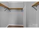 Unfinished storage with wooden shelving for optimal storage and organization at 1254 Raxter Rd, Edgemoor, SC 29712