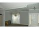 Bright living room featuring an elegant chandelier, sheer curtains, and neutral paint at 128 Summerlake Dr, New London, NC 28127