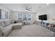 Bright bonus room with lots of natural light, comfortable seating, and room for fun activities at 16709 Mckee Rd, Charlotte, NC 28278