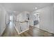 Upstairs hallway leading to other rooms, offering convenient access to bedrooms and bathrooms at 16709 Mckee Rd, Charlotte, NC 28278