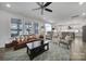 A spacious living room offers comfortable seating, natural light, and an open layout connecting to the kitchen at 16709 Mckee Rd, Charlotte, NC 28278