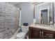 Bathroom featuring shower-tub combo, toilet, and vanity with sink at 2444 Fabyan Ln, Charlotte, NC 28262