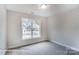 Cozy bedroom featuring carpet floors, natural light, and neutral decor at 3009 Bent Willow Dr # 160, Indian Trail, NC 28079